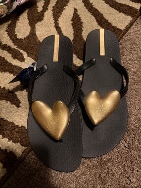Black Flip Flops with Gold Heart Accents 9
